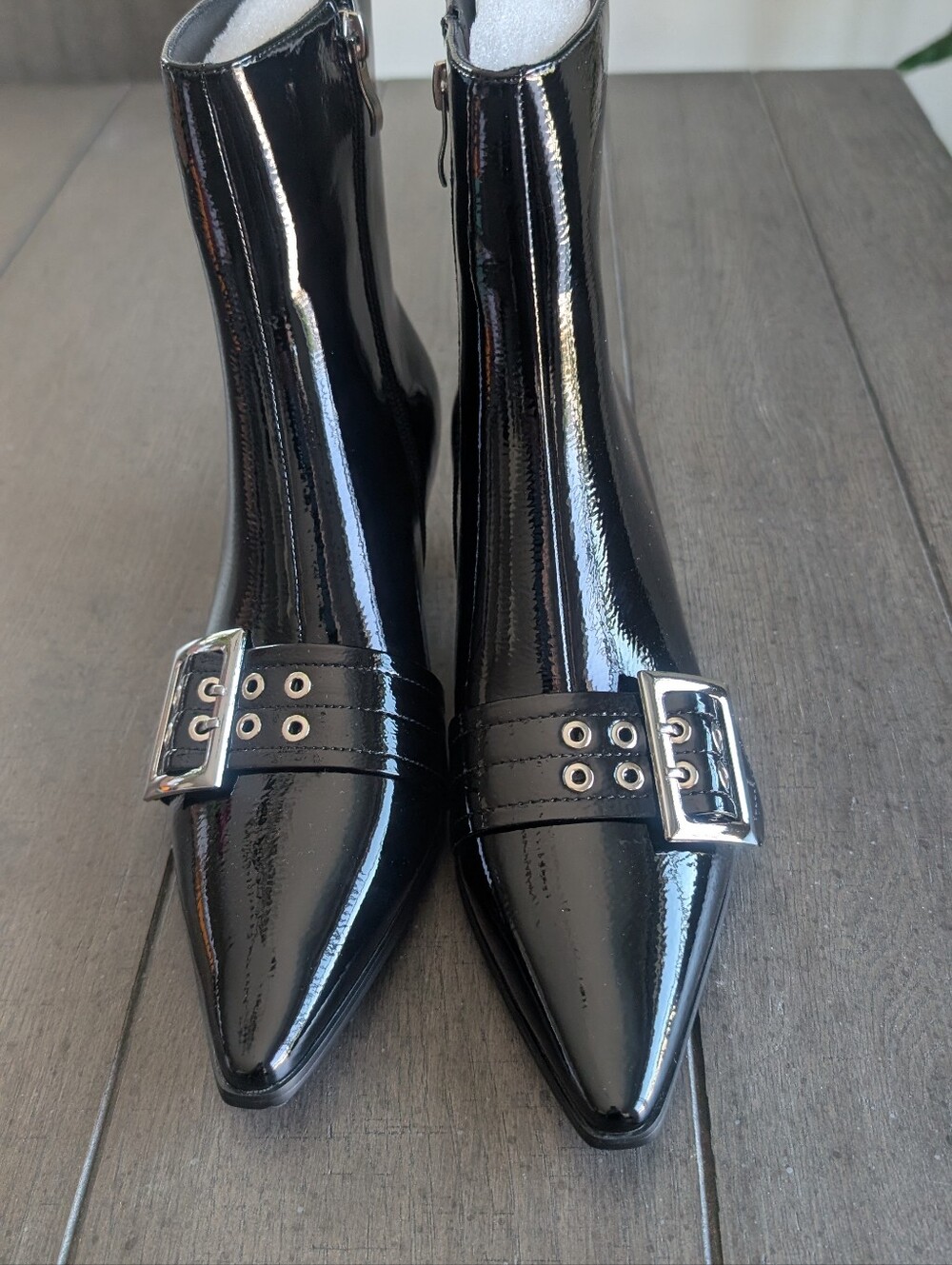 Black Patent Pointed-Toe Ankle Boots with Buckle Detail